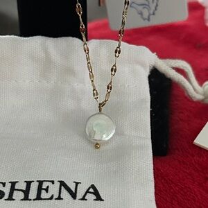 Oshena Designer beachwear Gold and Pearl Pendant Necklace